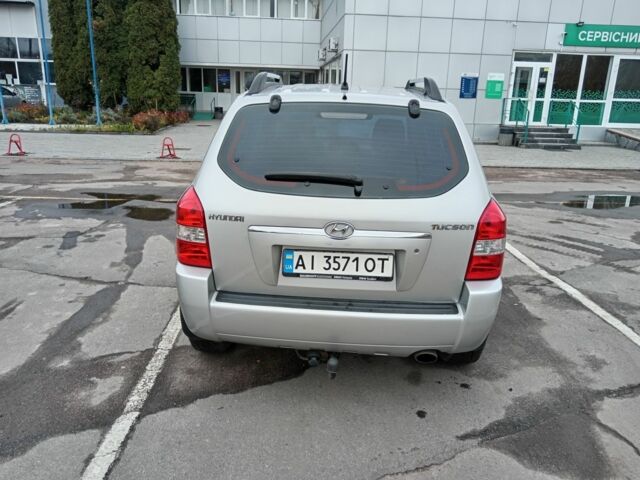 Серый Хендай Туксон, объемом двигателя 2 л и пробегом 267 тыс. км за 7200 $, фото 5 на Automoto.ua