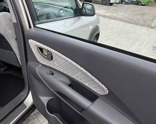 Серый Хендай Туксон, объемом двигателя 1.98 л и пробегом 243 тыс. км за 7100 $, фото 16 на Automoto.ua