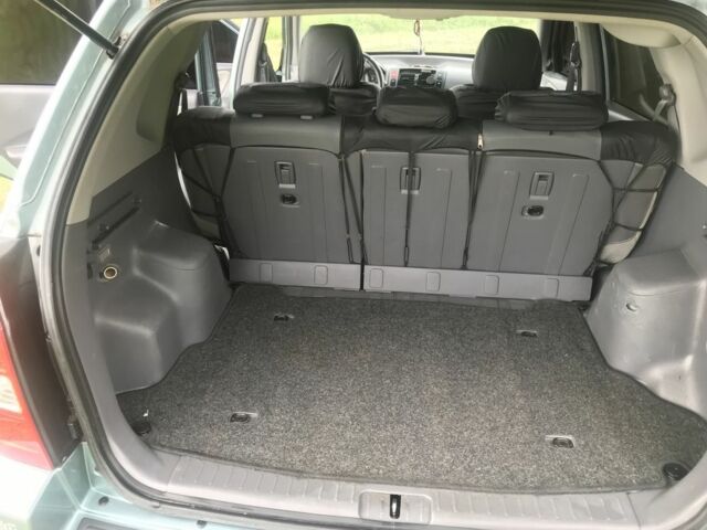 Серый Хендай Туксон, объемом двигателя 2 л и пробегом 240 тыс. км за 8100 $, фото 4 на Automoto.ua