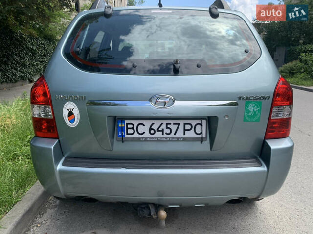 Серый Хендай Туксон, объемом двигателя 1.99 л и пробегом 194 тыс. км за 7850 $, фото 6 на Automoto.ua