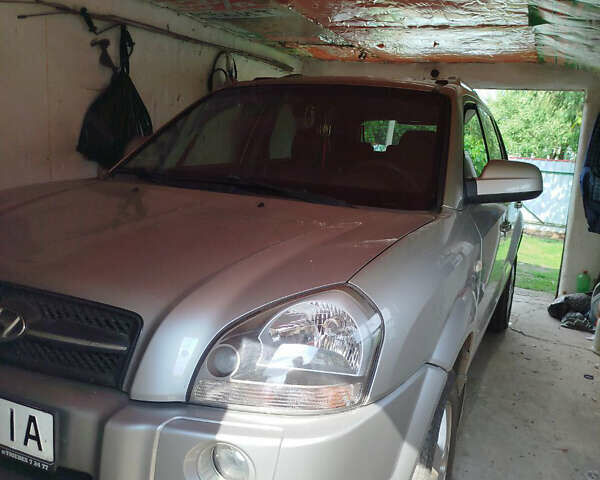 Сірий Хендай Туксон, об'ємом двигуна 1.98 л та пробігом 203 тис. км за 7200 $, фото 11 на Automoto.ua