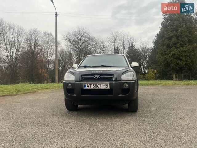 Серый Хендай Туксон, объемом двигателя 1.98 л и пробегом 205 тыс. км за 6700 $, фото 28 на Automoto.ua