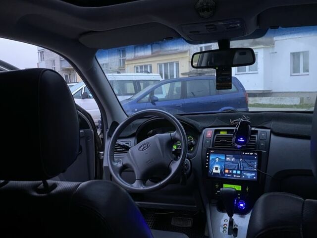 Серый Хендай Туксон, объемом двигателя 2.7 л и пробегом 172 тыс. км за 7500 $, фото 9 на Automoto.ua