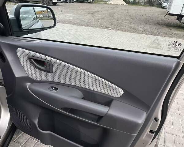 Серый Хендай Туксон, объемом двигателя 1.98 л и пробегом 243 тыс. км за 7100 $, фото 18 на Automoto.ua