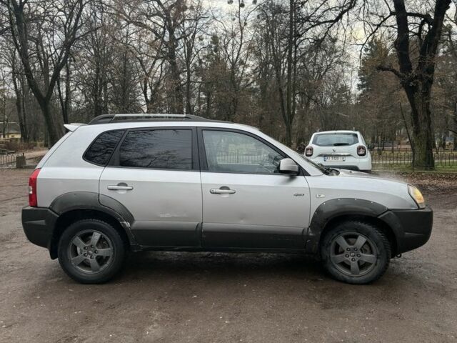 Сірий Хендай Туксон, об'ємом двигуна 2.7 л та пробігом 370 тис. км за 2900 $, фото 3 на Automoto.ua