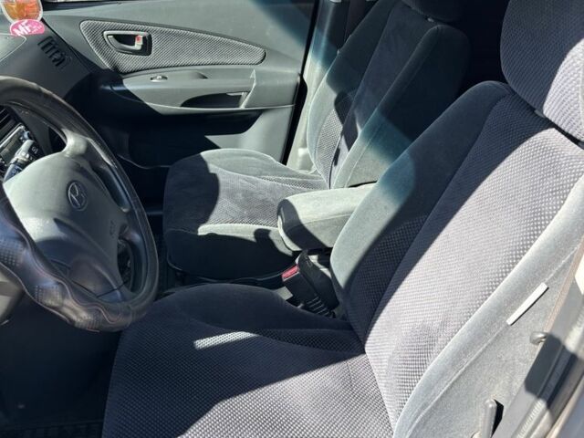 Серый Хендай Туксон, объемом двигателя 2 л и пробегом 270 тыс. км за 7300 $, фото 7 на Automoto.ua