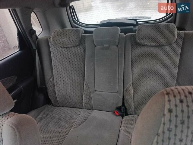 Серый Хендай Туксон, объемом двигателя 2 л и пробегом 280 тыс. км за 7200 $, фото 1 на Automoto.ua