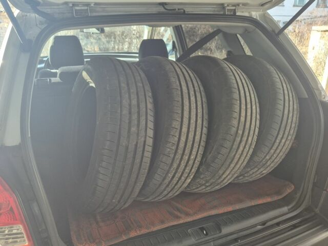 Сірий Хендай Туксон, об'ємом двигуна 2 л та пробігом 250 тис. км за 4132 $, фото 7 на Automoto.ua