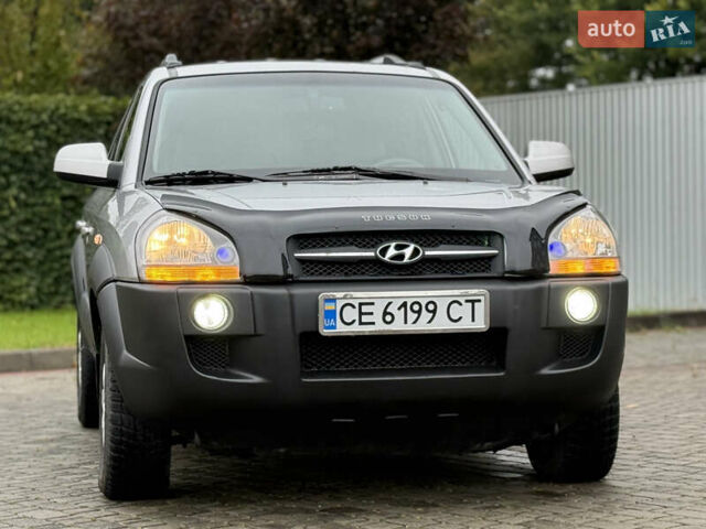 Сірий Хендай Туксон, об'ємом двигуна 1.99 л та пробігом 252 тис. км за 7700 $, фото 3 на Automoto.ua
