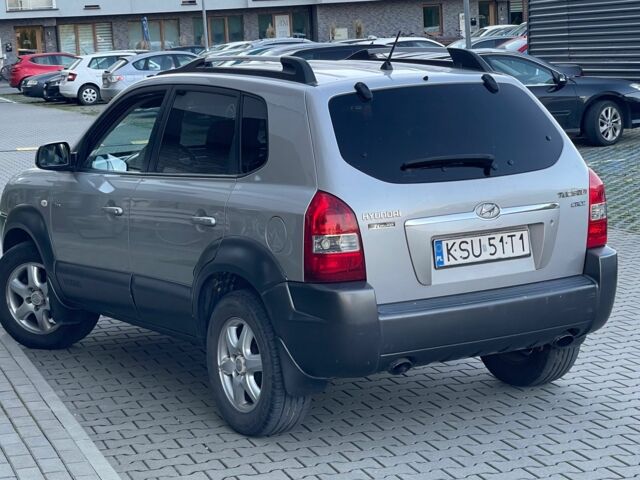 Серый Хендай Туксон, объемом двигателя 2 л и пробегом 192 тыс. км за 3479 $, фото 4 на Automoto.ua