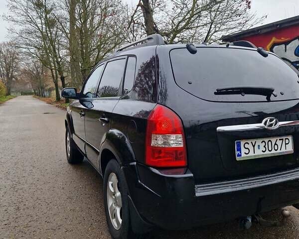 Серый Хендай Туксон, объемом двигателя 2 л и пробегом 240 тыс. км за 4200 $, фото 4 на Automoto.ua