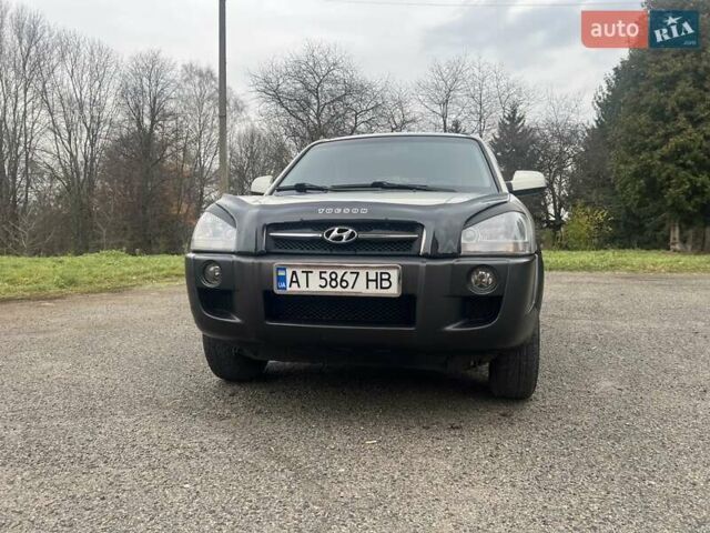 Серый Хендай Туксон, объемом двигателя 1.98 л и пробегом 205 тыс. км за 6700 $, фото 17 на Automoto.ua