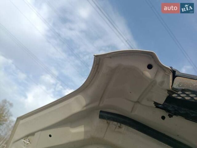 Серый Хендай Туксон, объемом двигателя 1.98 л и пробегом 181 тыс. км за 7000 $, фото 24 на Automoto.ua