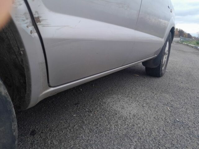 Сірий Хендай Туксон, об'ємом двигуна 2 л та пробігом 310 тис. км за 3884 $, фото 9 на Automoto.ua