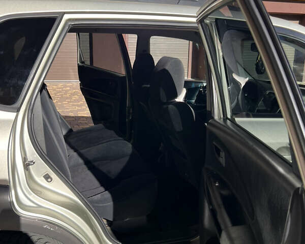 Серый Хендай Туксон, объемом двигателя 2 л и пробегом 285 тыс. км за 6500 $, фото 11 на Automoto.ua