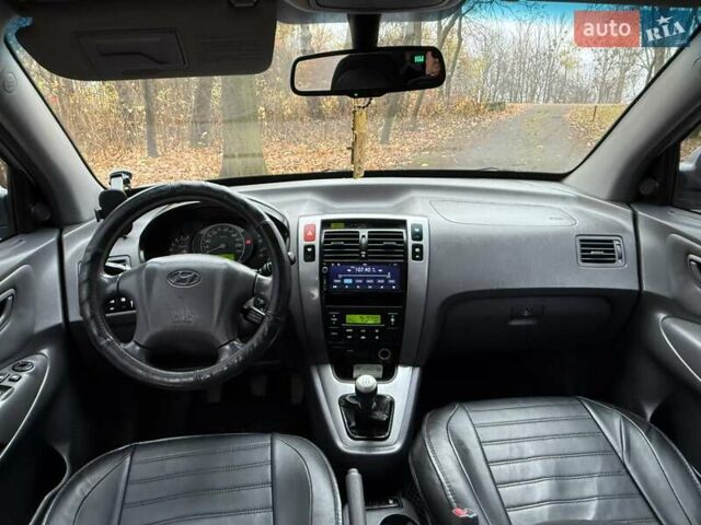 Серый Хендай Туксон, объемом двигателя 2 л и пробегом 248 тыс. км за 6599 $, фото 22 на Automoto.ua