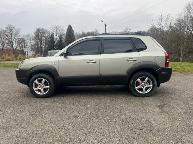 Серый Хендай Туксон, объемом двигателя 2 л и пробегом 205 тыс. км за 6700 $, фото 9 на Automoto.ua