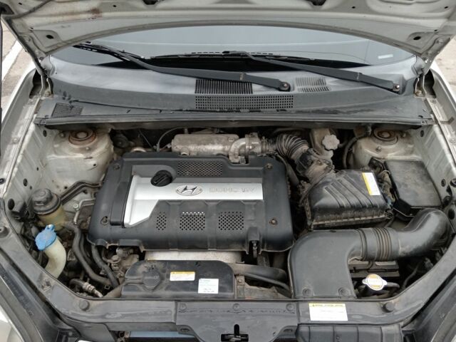 Серый Хендай Туксон, объемом двигателя 2 л и пробегом 267 тыс. км за 7200 $, фото 14 на Automoto.ua