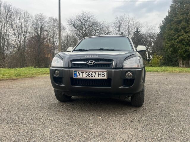 Серый Хендай Туксон, объемом двигателя 2 л и пробегом 205 тыс. км за 6700 $, фото 3 на Automoto.ua