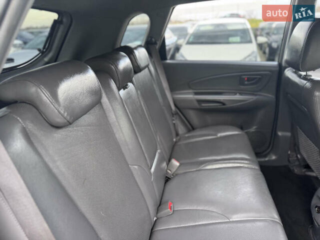 Серый Хендай Туксон, объемом двигателя 2 л и пробегом 155 тыс. км за 6989 $, фото 46 на Automoto.ua