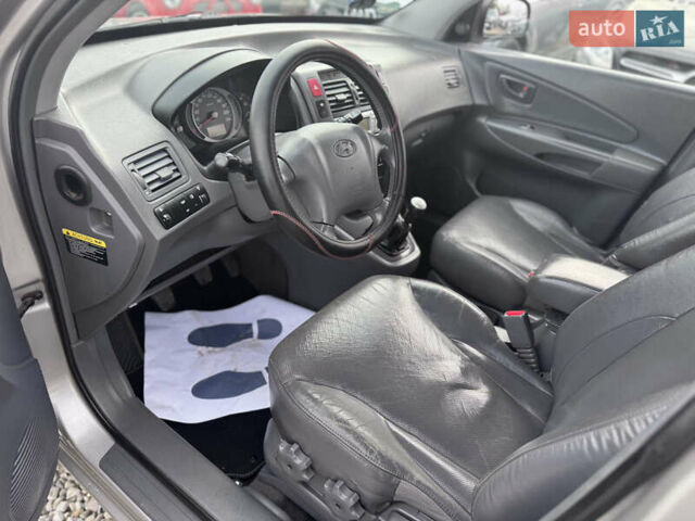 Серый Хендай Туксон, объемом двигателя 2 л и пробегом 155 тыс. км за 6989 $, фото 29 на Automoto.ua