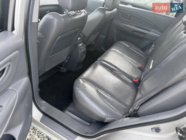 Серый Хендай Туксон, объемом двигателя 2 л и пробегом 155 тыс. км за 6989 $, фото 40 на Automoto.ua