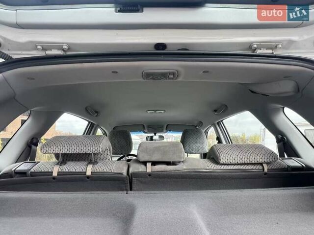 Серый Хендай Туксон, объемом двигателя 1.98 л и пробегом 243 тыс. км за 7100 $, фото 13 на Automoto.ua