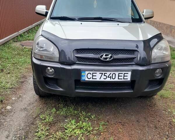 Сірий Хендай Туксон, об'ємом двигуна 1.99 л та пробігом 282 тис. км за 6200 $, фото 3 на Automoto.ua