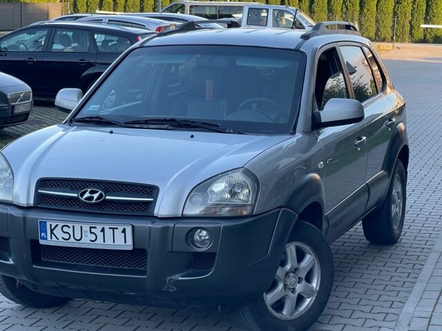 Серый Хендай Туксон, объемом двигателя 2 л и пробегом 192 тыс. км за 3479 $, фото 3 на Automoto.ua