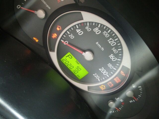 Сірий Хендай Туксон, об'ємом двигуна 2 л та пробігом 205 тис. км за 7754 $, фото 7 на Automoto.ua