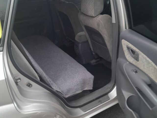 Сірий Хендай Туксон, об'ємом двигуна 2 л та пробігом 310 тис. км за 3884 $, фото 11 на Automoto.ua