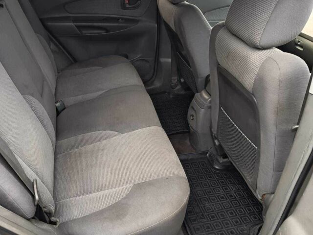 Серый Хендай Туксон, объемом двигателя 2 л и пробегом 196 тыс. км за 3500 $, фото 8 на Automoto.ua