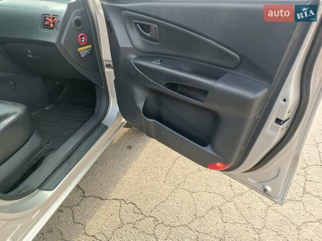 Серый Хендай Туксон, объемом двигателя 1.98 л и пробегом 181 тыс. км за 7000 $, фото 18 на Automoto.ua