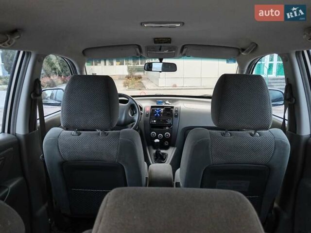 Серый Хендай Туксон, объемом двигателя 1.98 л и пробегом 267 тыс. км за 7200 $, фото 2 на Automoto.ua