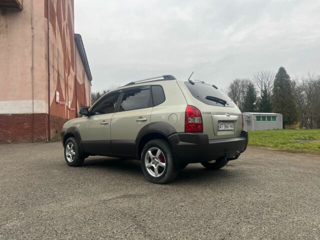 Серый Хендай Туксон, объемом двигателя 2 л и пробегом 205 тыс. км за 6700 $, фото 10 на Automoto.ua