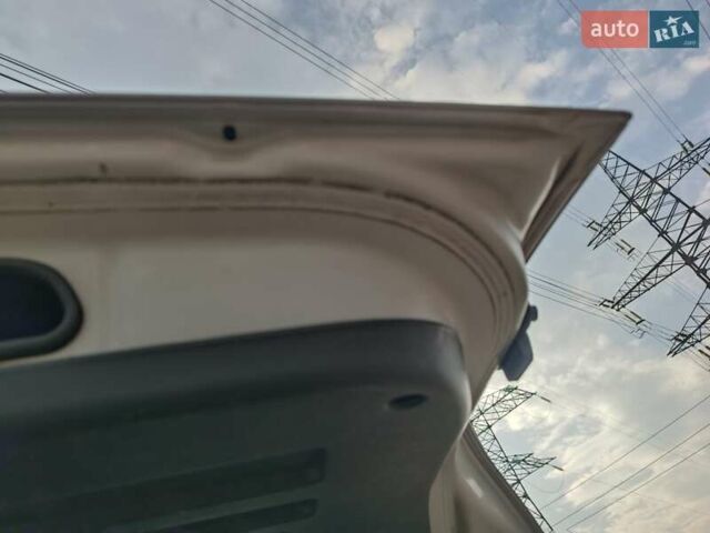 Серый Хендай Туксон, объемом двигателя 1.98 л и пробегом 181 тыс. км за 7000 $, фото 10 на Automoto.ua