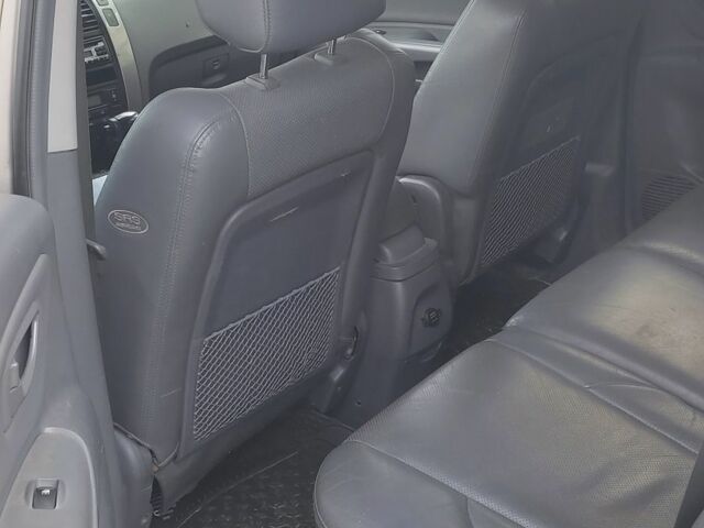 Серый Хендай Туксон, объемом двигателя 2 л и пробегом 264 тыс. км за 4500 $, фото 11 на Automoto.ua