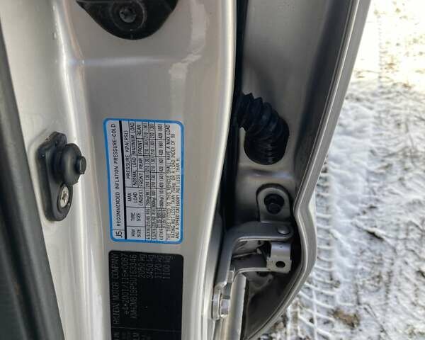 Серый Хендай Туксон, объемом двигателя 1.98 л и пробегом 250 тыс. км за 7900 $, фото 11 на Automoto.ua