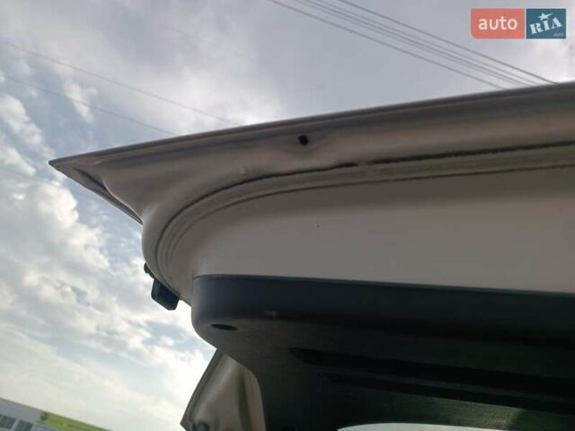 Серый Хендай Туксон, объемом двигателя 1.98 л и пробегом 181 тыс. км за 7000 $, фото 9 на Automoto.ua