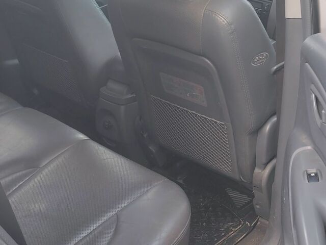 Серый Хендай Туксон, объемом двигателя 2 л и пробегом 264 тыс. км за 4500 $, фото 13 на Automoto.ua