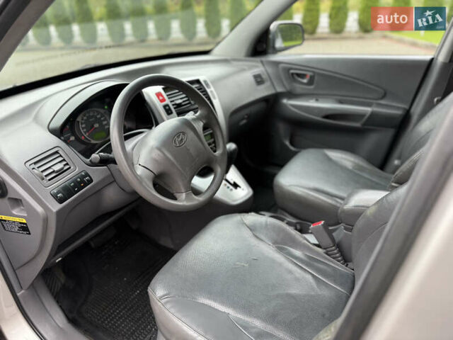 Сірий Хендай Туксон, об'ємом двигуна 1.99 л та пробігом 252 тис. км за 7700 $, фото 20 на Automoto.ua