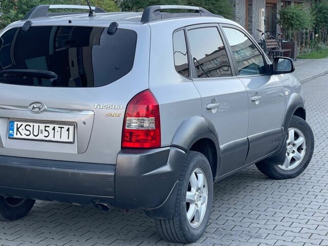 Серый Хендай Туксон, объемом двигателя 2 л и пробегом 192 тыс. км за 3479 $, фото 2 на Automoto.ua