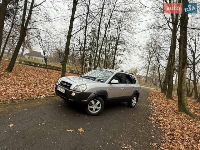 Серый Хендай Туксон, объемом двигателя 2 л и пробегом 248 тыс. км за 6599 $, фото 3 на Automoto.ua