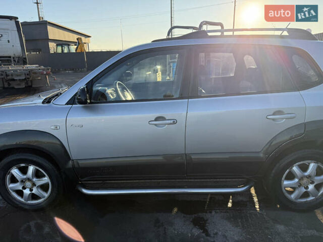 Серый Хендай Туксон, объемом двигателя 1.99 л и пробегом 215 тыс. км за 5980 $, фото 7 на Automoto.ua