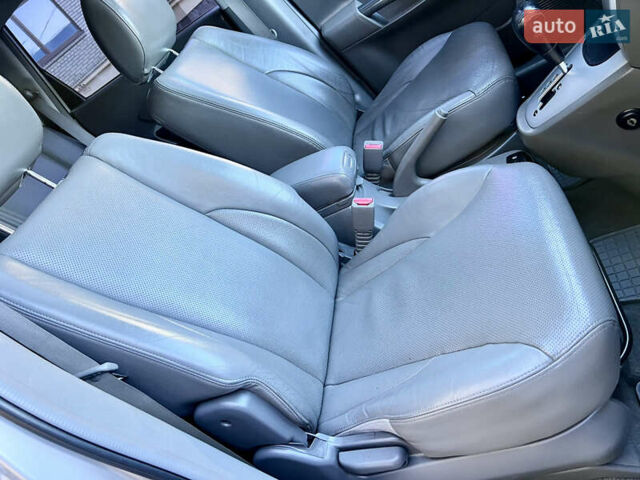 Сірий Хендай Туксон, об'ємом двигуна 2 л та пробігом 215 тис. км за 7350 $, фото 54 на Automoto.ua