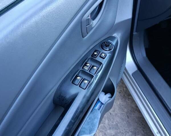 Серый Хендай Туксон, объемом двигателя 1.99 л и пробегом 222 тыс. км за 7800 $, фото 13 на Automoto.ua