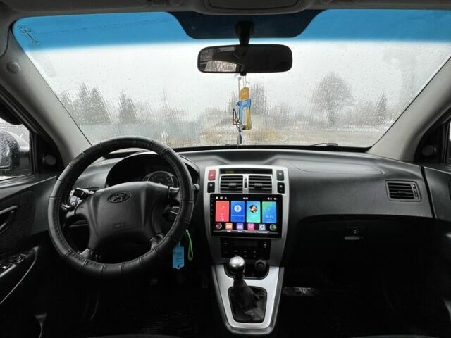 Сірий Хендай Туксон, об'ємом двигуна 2 л та пробігом 241 тис. км за 6700 $, фото 7 на Automoto.ua