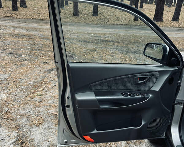 Сірий Хендай Туксон, об'ємом двигуна 1.98 л та пробігом 186 тис. км за 8200 $, фото 34 на Automoto.ua