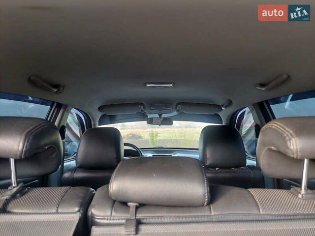 Серый Хендай Туксон, объемом двигателя 1.98 л и пробегом 175 тыс. км за 6050 $, фото 9 на Automoto.ua