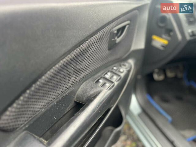 Серый Хендай Туксон, объемом двигателя 1.98 л и пробегом 253 тыс. км за 7650 $, фото 12 на Automoto.ua